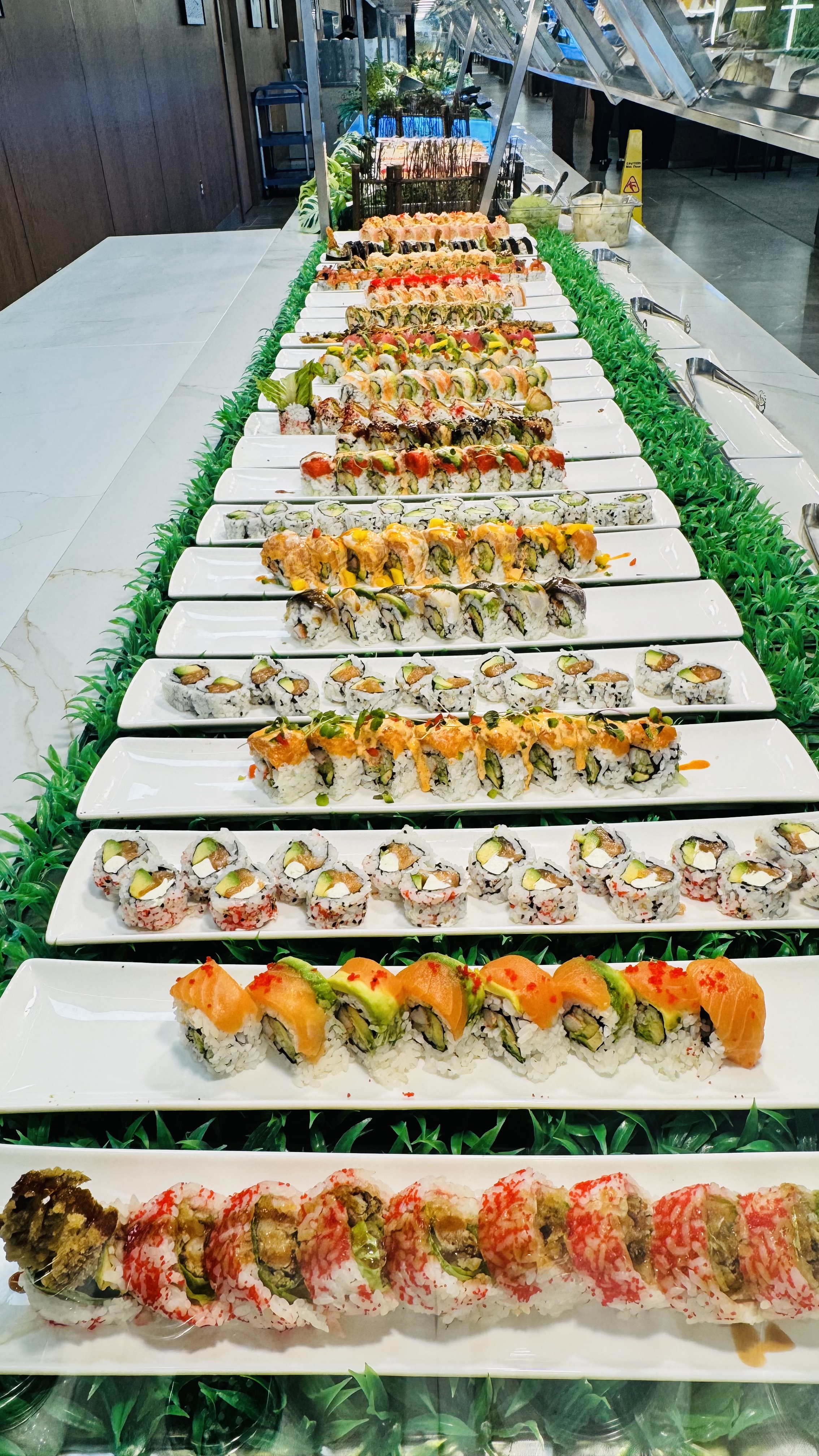 Colorful sushi rolls presented on the buffet